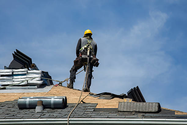 Professional Roofing technician working in Pointblank, TX